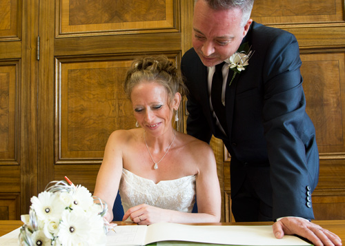 signing the register at Barnsley Town Hall Wedding