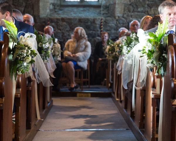 The decorated Pews at St John the Baptist chuch Adwick upon Dearne wedding photographer