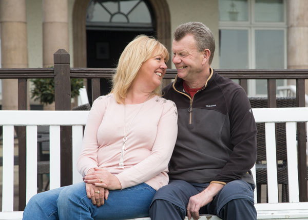 A couple on a bench at the old weighing room Doncaster racecourse
