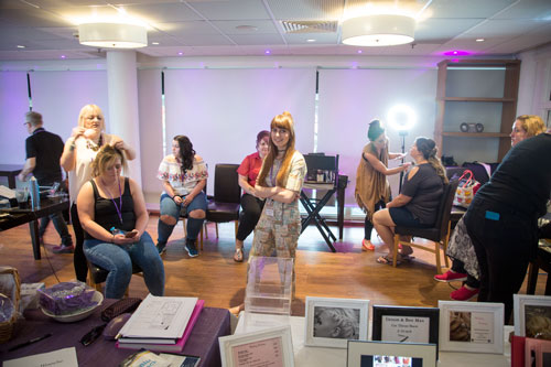 Hannah from Barnsley Fashion Creatives in the middle of the Rigby Suite Barnsley surrounded by models getting ready.