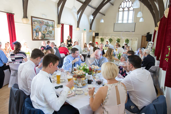 Guests during the wedding breakfast at Cawthorne Village Hall