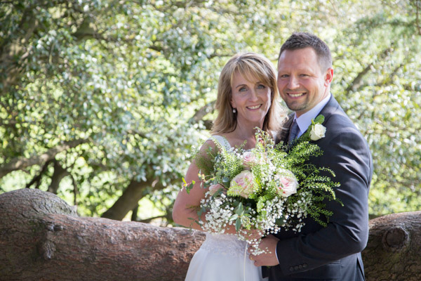 Bride and Groom in the gardens of Cannon Hall on their wedding day Wedding Photographer Barnsley