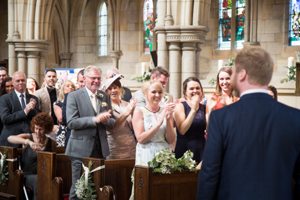 Guests cheering at Wentworth Church Wedding