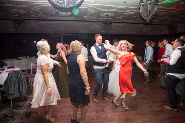 Guests dancing during Cornhill Castle wedding