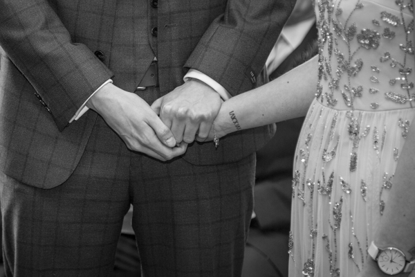 Bride and Groom holding hands Barnsley Town Hall Wedding