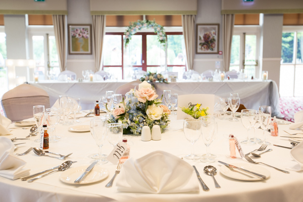 Table setting at Bagden Hall hotel with personalised luggae tags