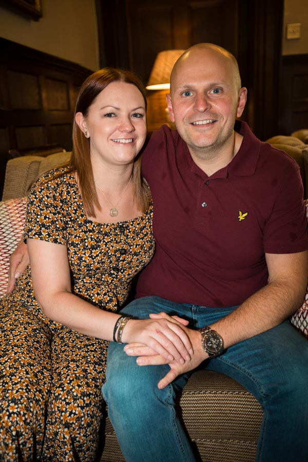 Couple look at each other on their pre-wedding session at whitley hall hotel