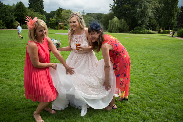Bride laughing with guests at Bagden Hall hotel Wedding