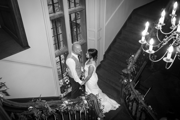 Bride and groom on the stairs at Whitley Hall Wedding