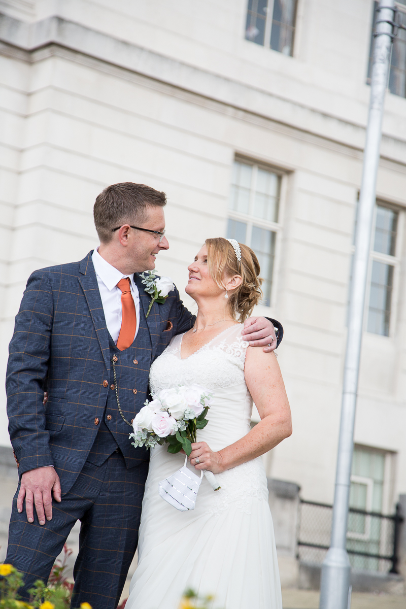 Couple outside Barnsley Town Hall on their wedding day