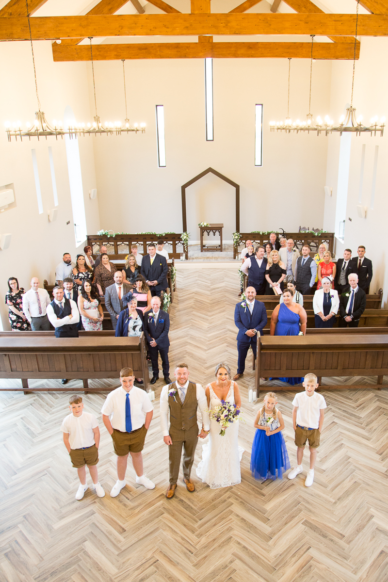 Group shot inside the Chapel at Burntwood Court