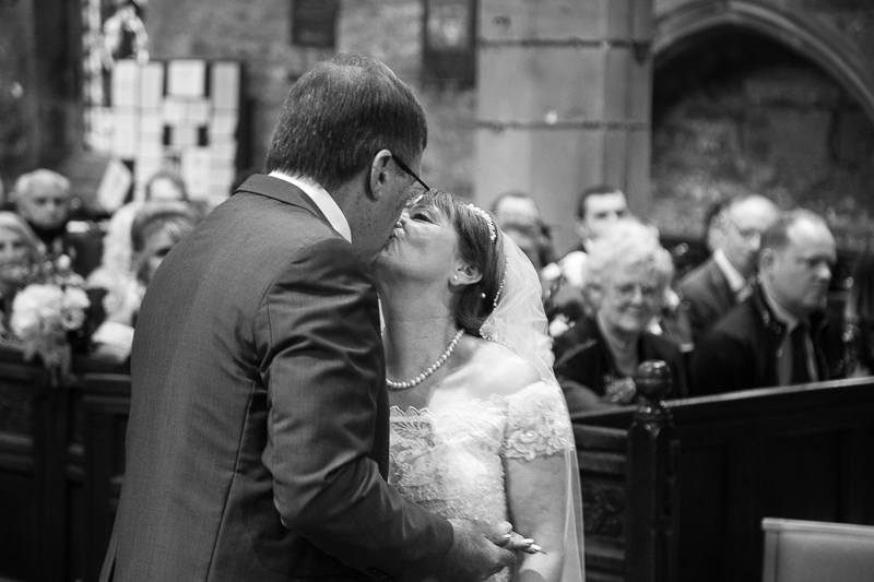 COuples first kiss as husband and wife at All Saints Church Darfield