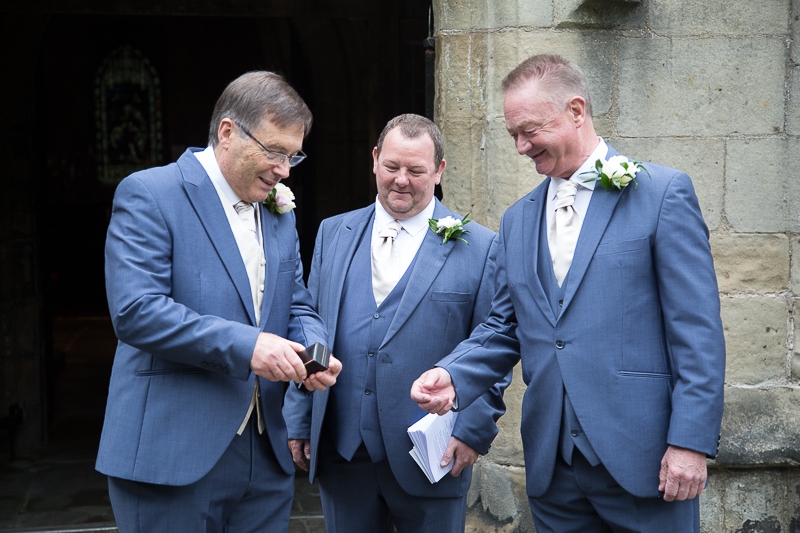 Groom and Groomsmen outside All saints church in Darfield