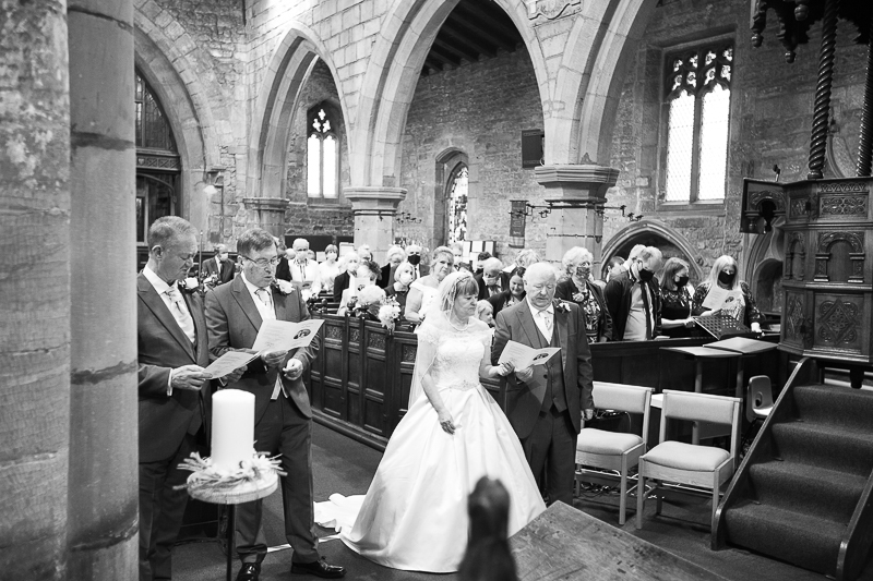 Hymns at a wedding ceremony at All Saints Church Darfield