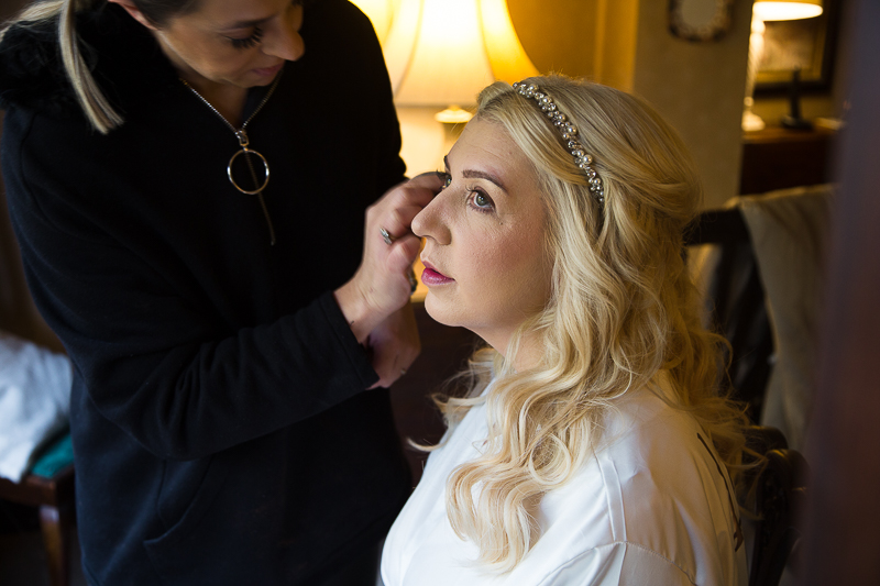 Bride having her makeup done on the morning of the wedding captured by Wedding photographer south Yorkshire