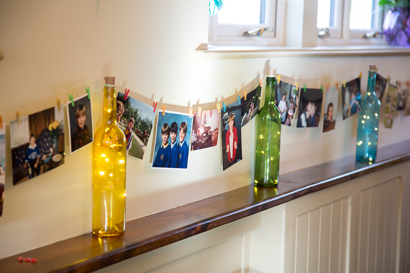 Coloured bottles with fairy lights at Cubley Hall