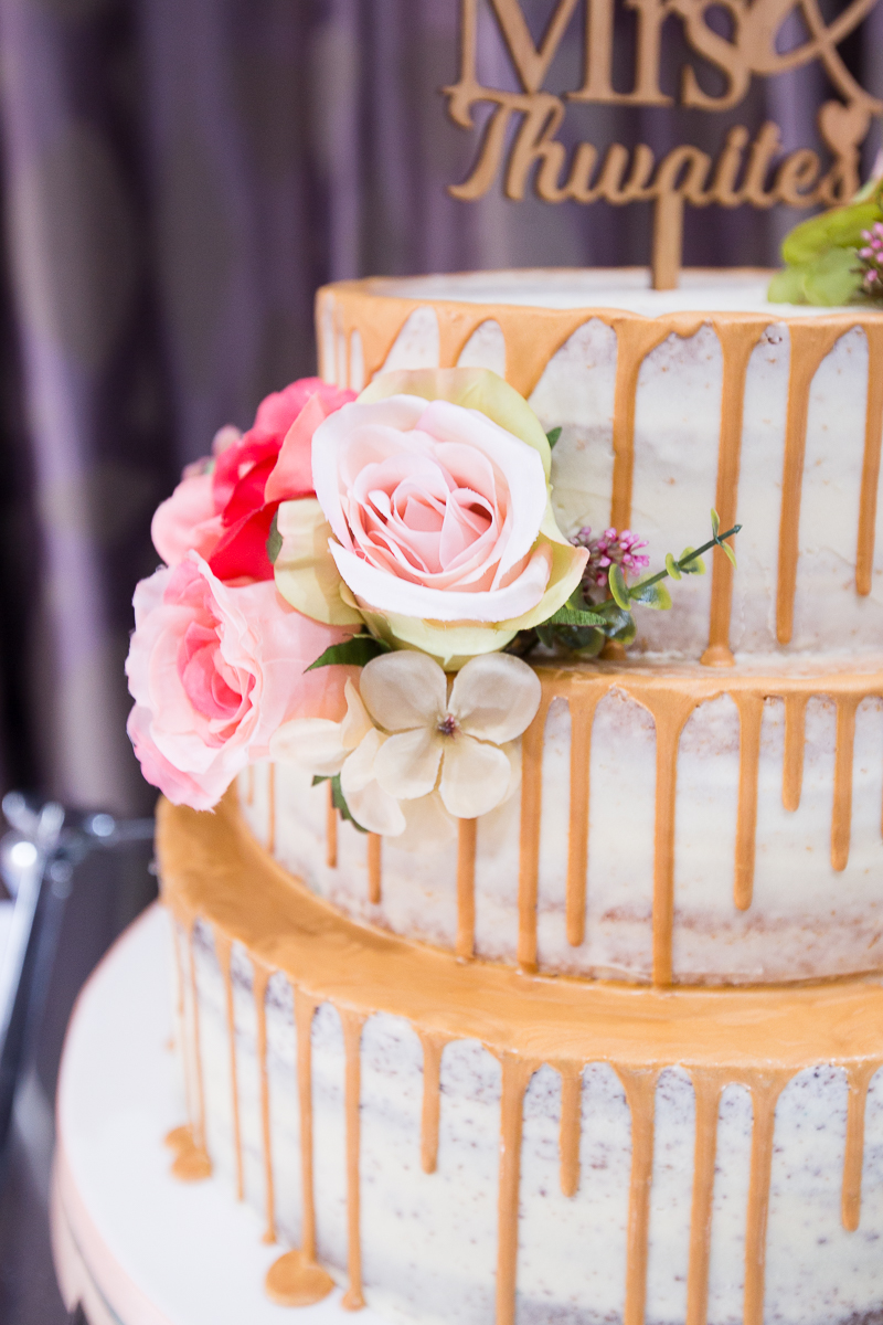 Drip wedding cake with flowers