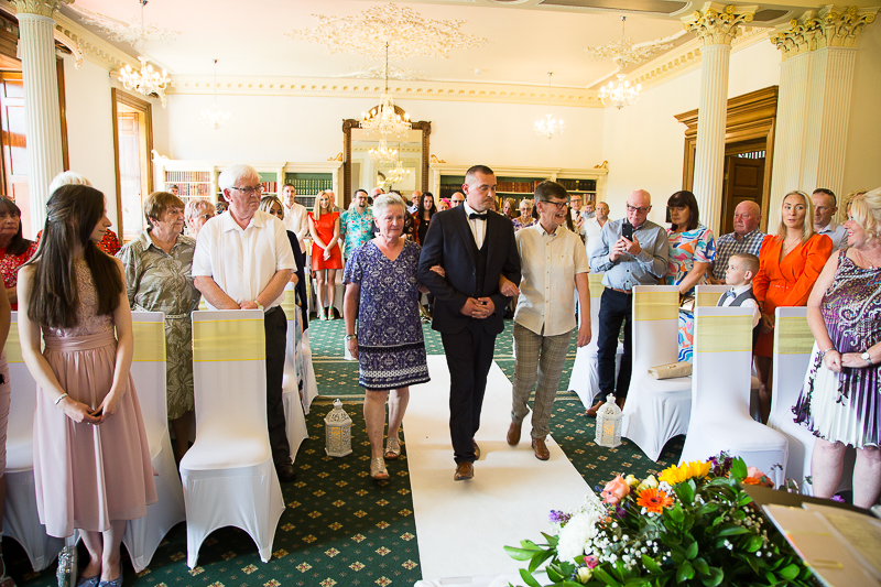Couple walking down the aisle at Wortley Hall Hotel Sheffield