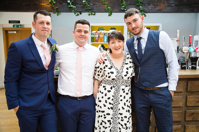 Family Portraits in front of the bar at The Beehive at The Garrison Wedding Venue by Wedding Photographer South Yorkshire