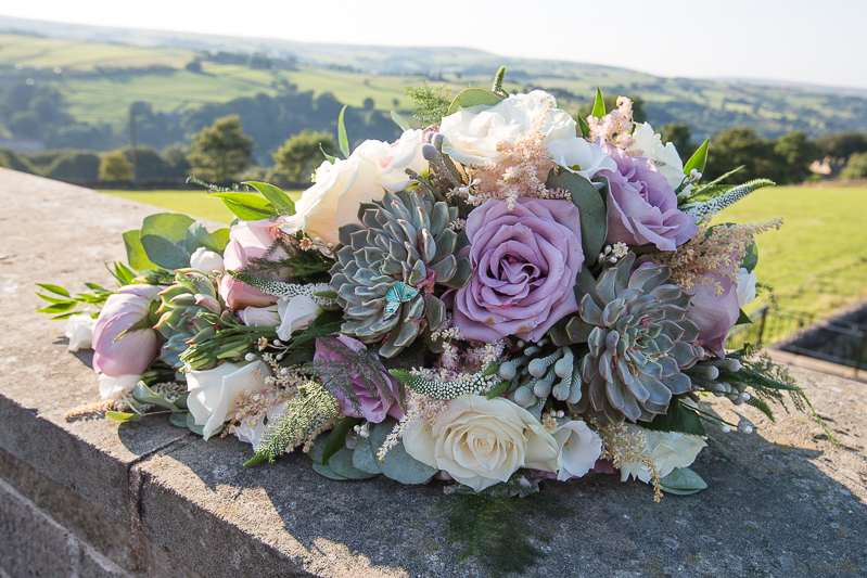 The wedding bouquet at The Fleece Countryside Inn Wedding by Charlotte Elizabeth Photography