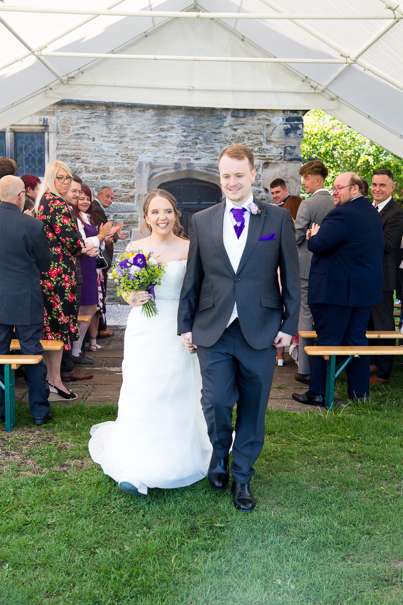 Couple walking back down the aisle at Sheffield Manor Lodge Wedding Photographer