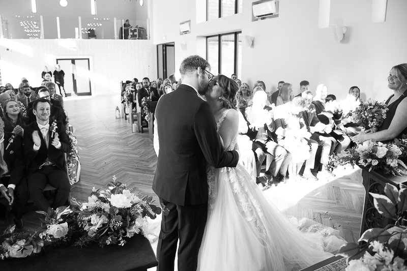 The wedding ceremony in the chapel at Burntwood Court Hotel wedding photographer