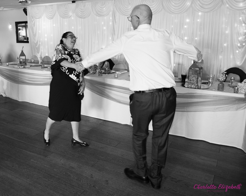 Wedding guests dancing at Shaw Lane Sports Club Barnsley wedding photographer