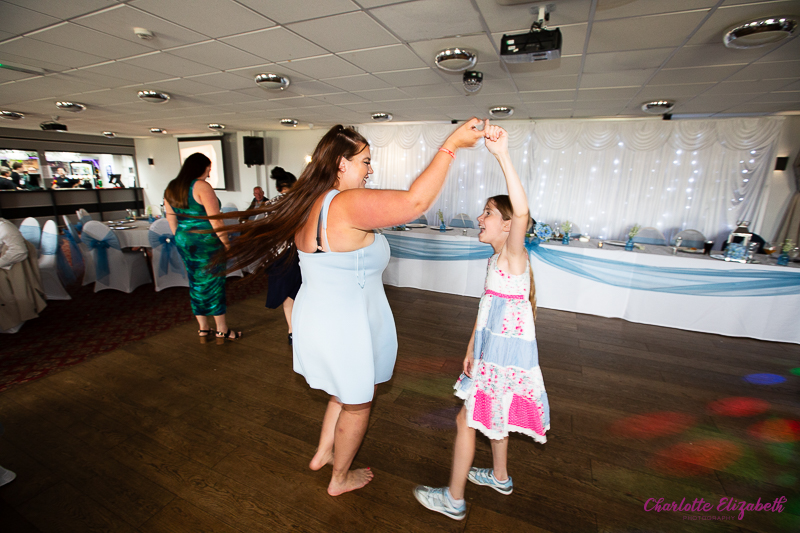 wedding guests dancing at Shaw Lane Sports Club Barnsley wedding photographer