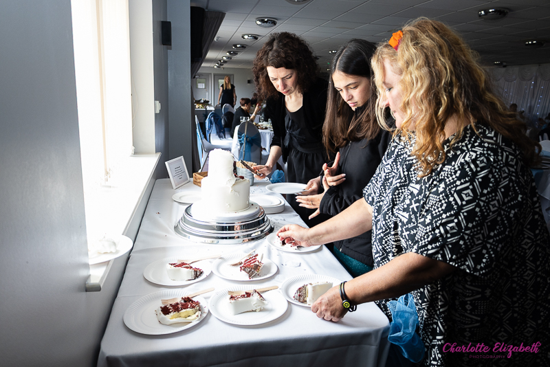 Cake cutting at Shaw Lane Sports Club Barnsley wedding photographer