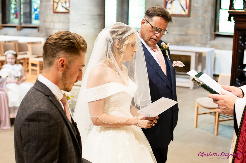 Wedding ceremony at St Margaret's Church Swinton by Charlotte Elizabeth natural wedding Photography