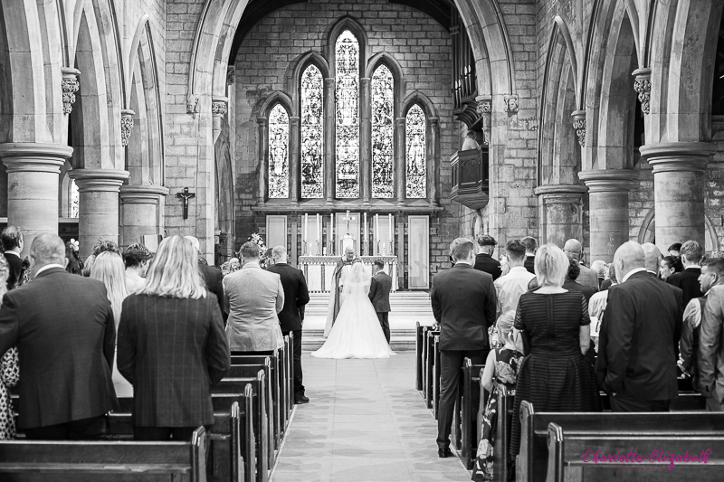 Wedding ceremony at St Margaret's Church Swinton by Charlotte Elizabeth natural wedding Photography