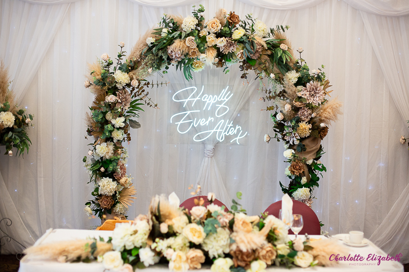 The wedding reception room with neon sign at Burntwood