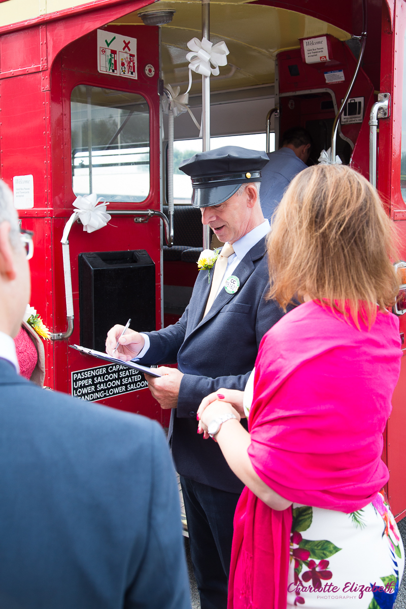 big red bus at a Barnsley wedding day at Cawthorne Village Hall and Barnsley registry office