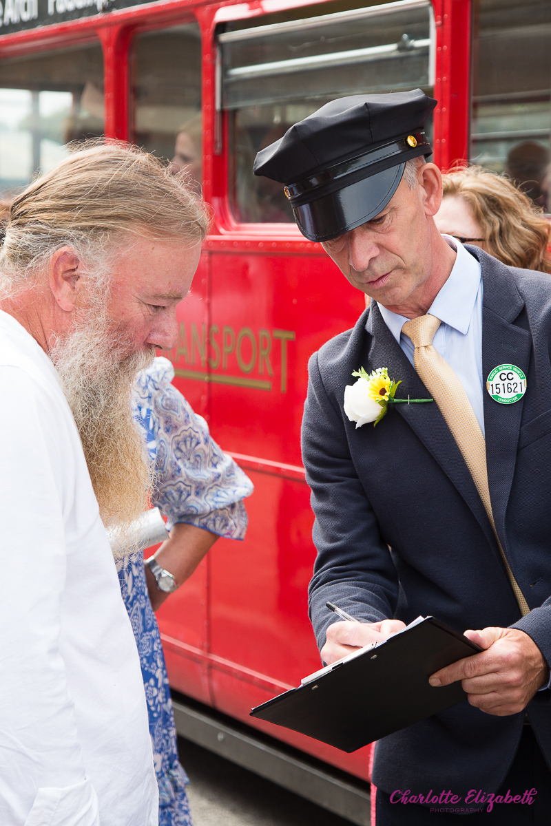 big red bus at a Barnsley wedding day at Cawthorne Village Hall and Barnsley registry office