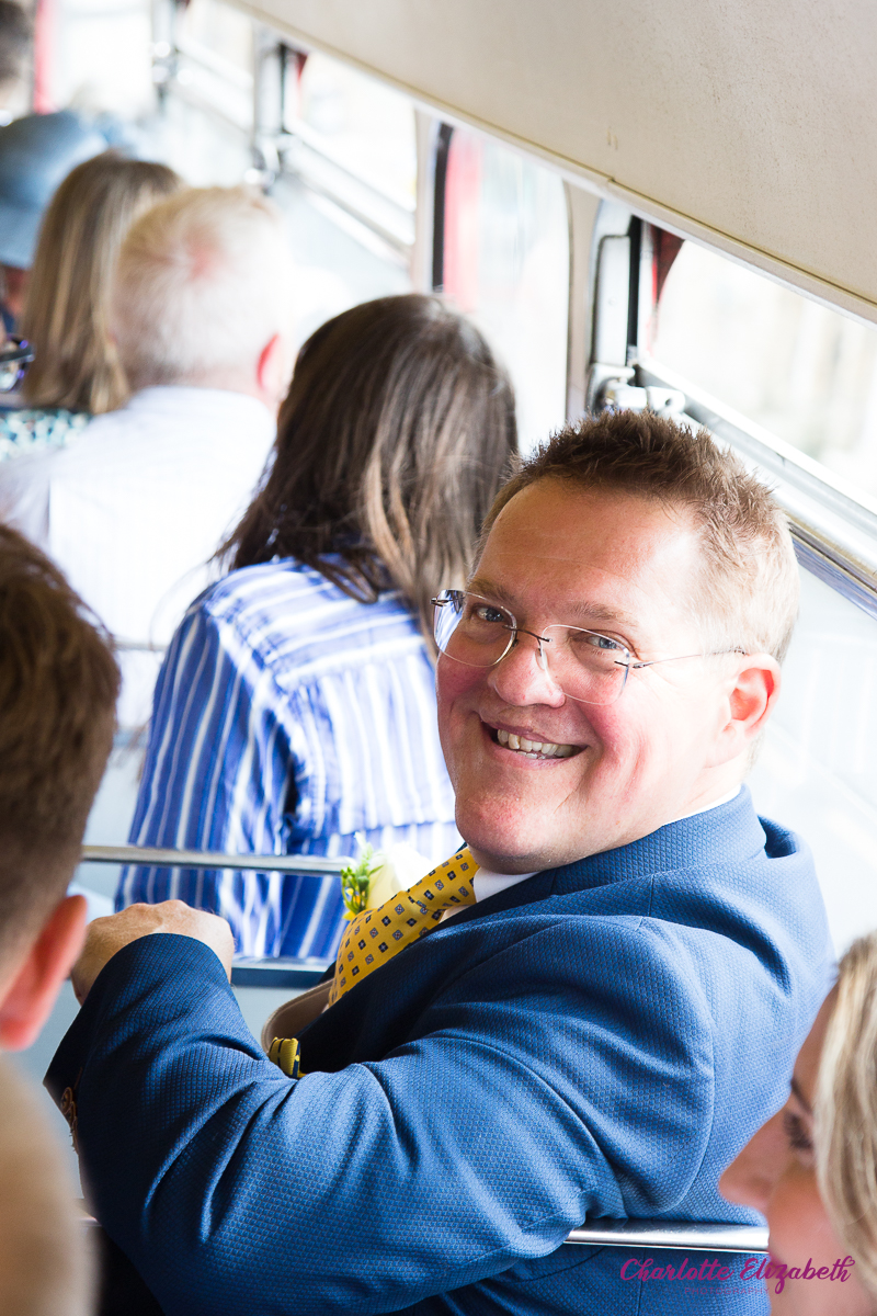 big red bus at a Barnsley wedding day at Cawthorne Village Hall and Barnsley registry office