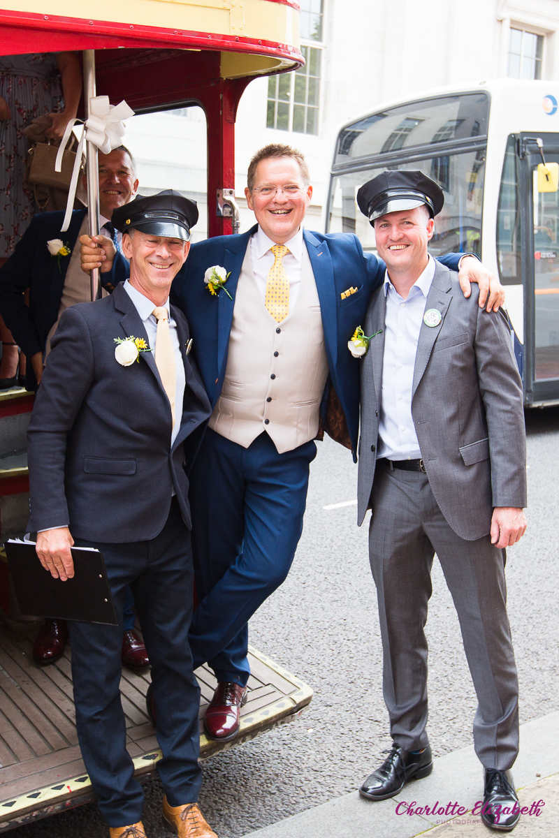 big red bus at a Barnsley wedding day at Cawthorne Village Hall and Barnsley registry office